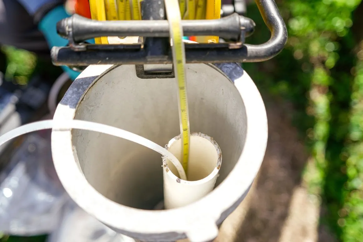 Measuring the water level inside a well casing